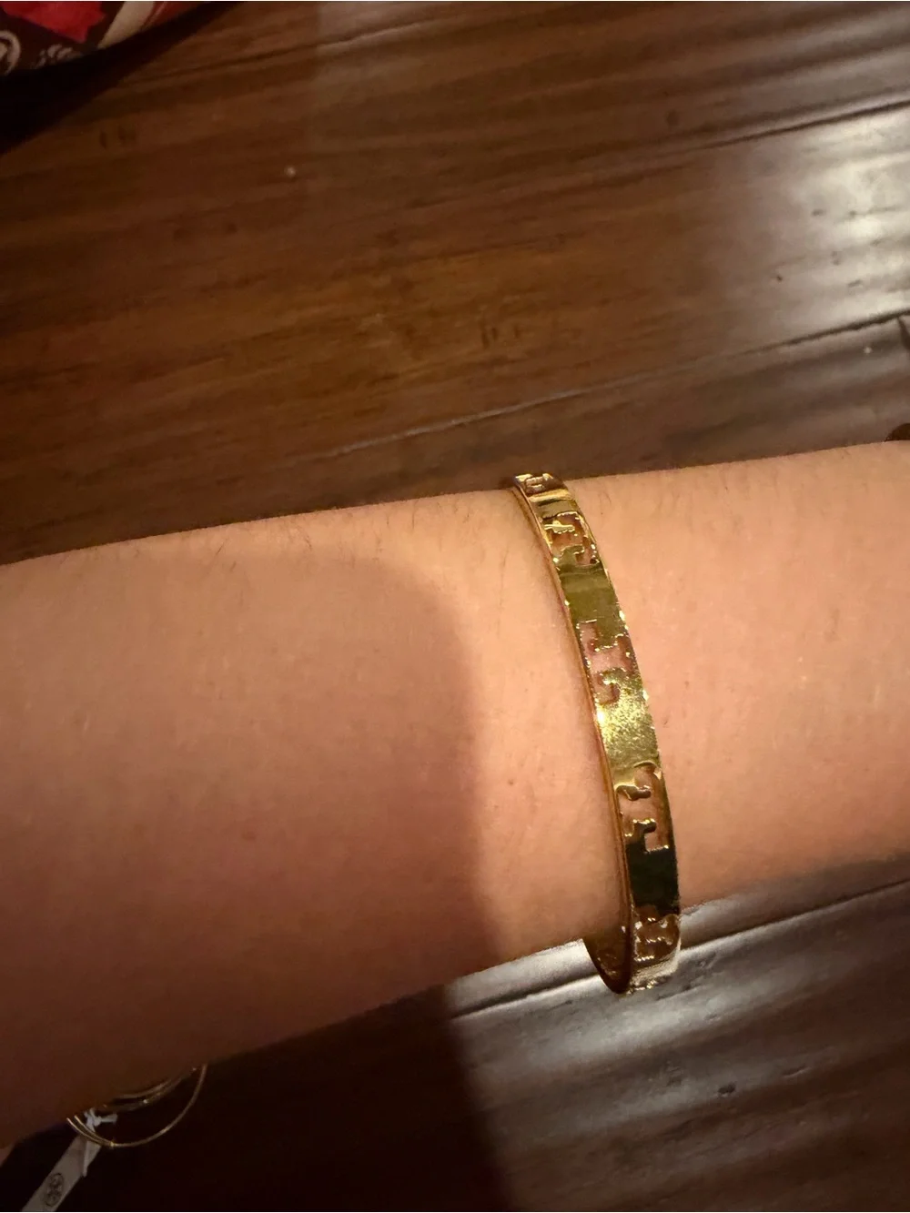 Tory Burch sleek gold